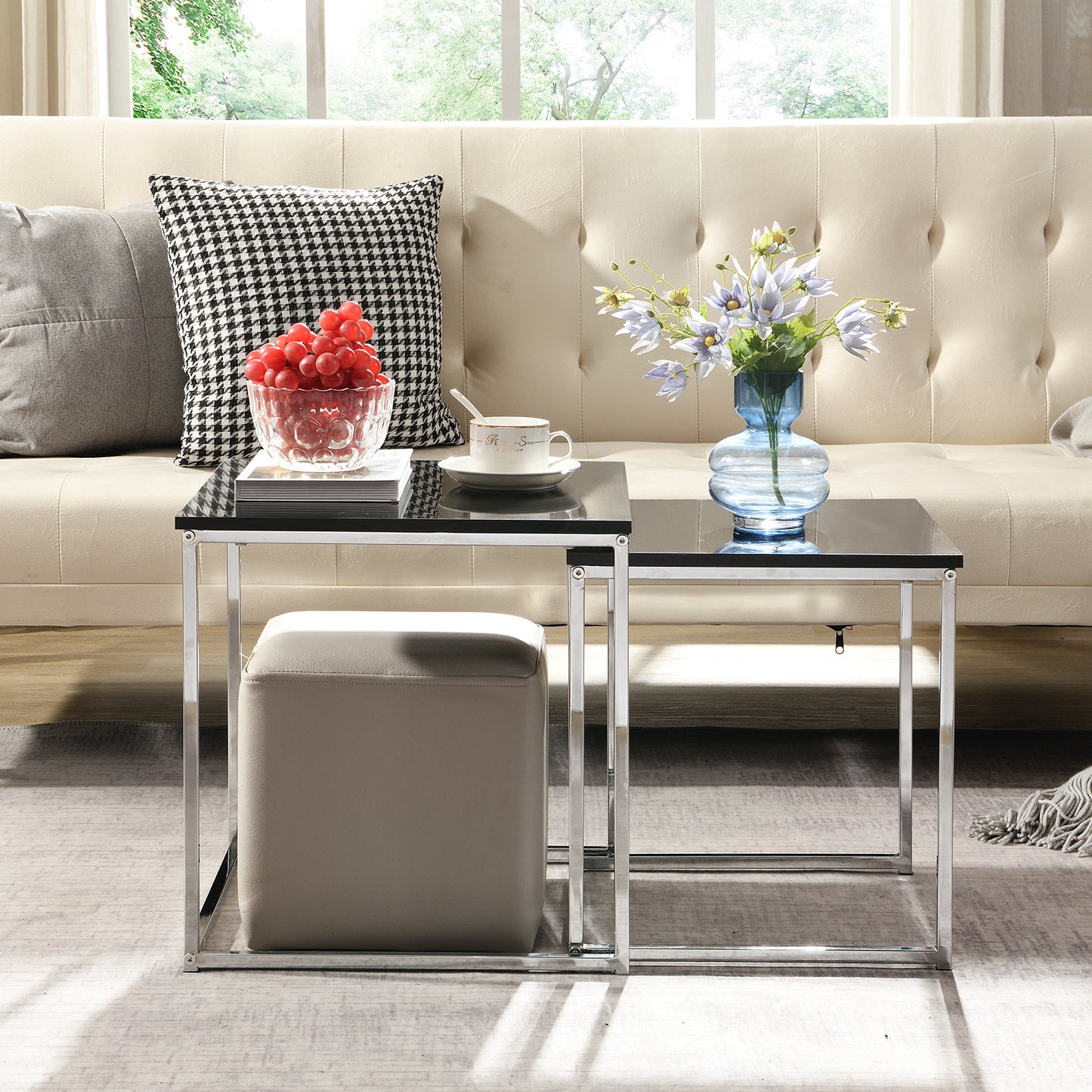 This modern nesting coffee table set features a sleek blake high-gloss finish and a durable metal frame. Its space-saving, detachable design is versatile for any living room, office, or compact space.