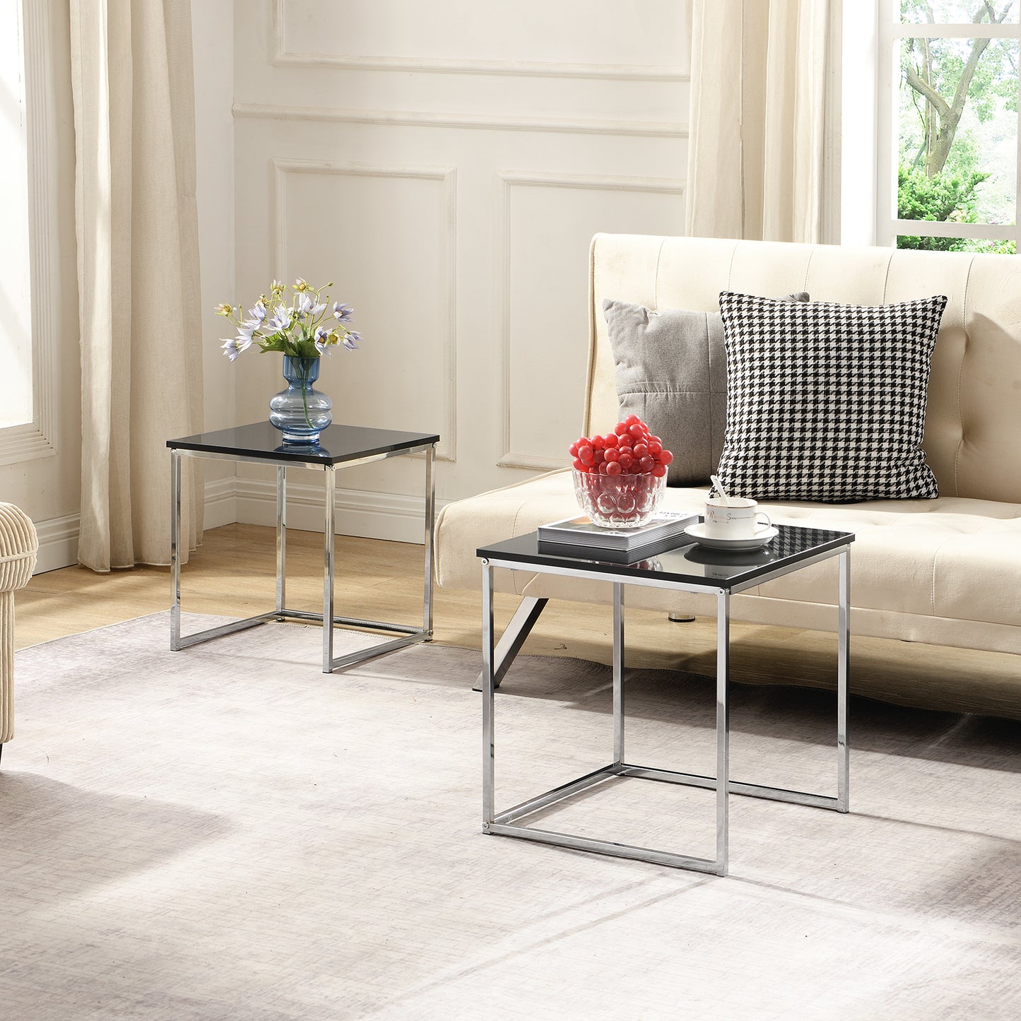 This modern nesting coffee table set features a sleek blake high-gloss finish and a durable metal frame. Its space-saving, detachable design is versatile for any living room, office, or compact space.