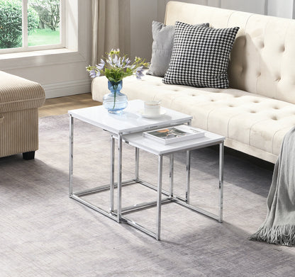 This modern nesting coffee table set features a sleek white high-gloss finish and a durable metal frame. Its space-saving, detachable design is versatile for any living room, office, or compact space.