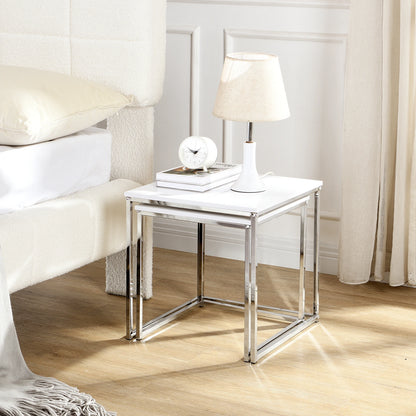This modern nesting coffee table set features a sleek white high-gloss finish and a durable metal frame. Its space-saving, detachable design is versatile for any living room, office, or compact space.