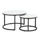 Modern round nesting coffee tables with white marble-look tops and black metal frames, offering flexible layered or separate use for small living spaces.