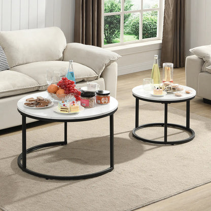Modern round nesting coffee tables with white marble-look tops and black metal frames, offering flexible layered or separate use for small living spaces.